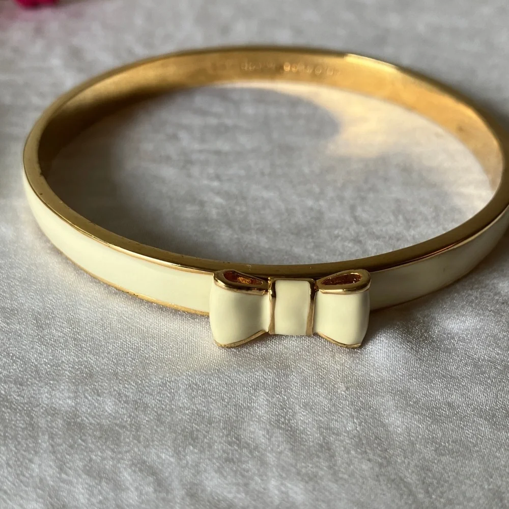 Kate Spade: “Take a Bow” Cream & Gold Tone Bow Bracelet & Dust Bag - Picture 7 of 11
